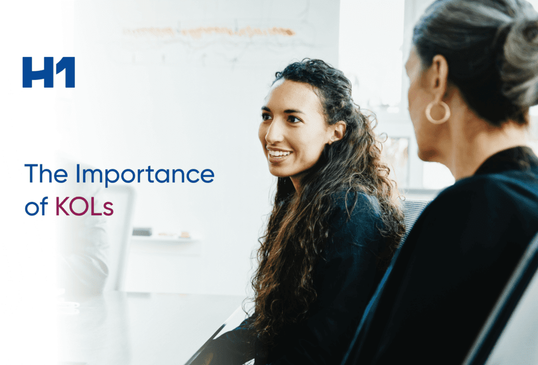 Two female executives sitting in chairs