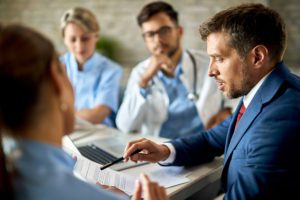 Businessman meeting with doctors