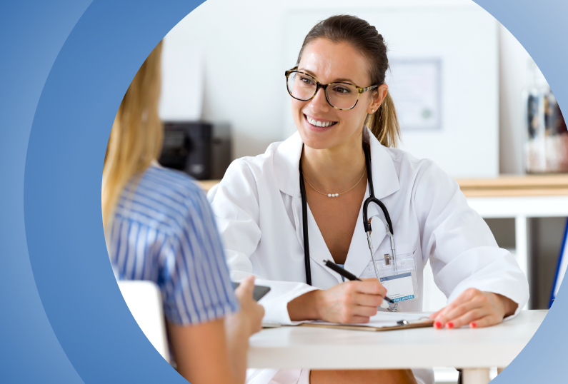 Doctor with patient and writing notes