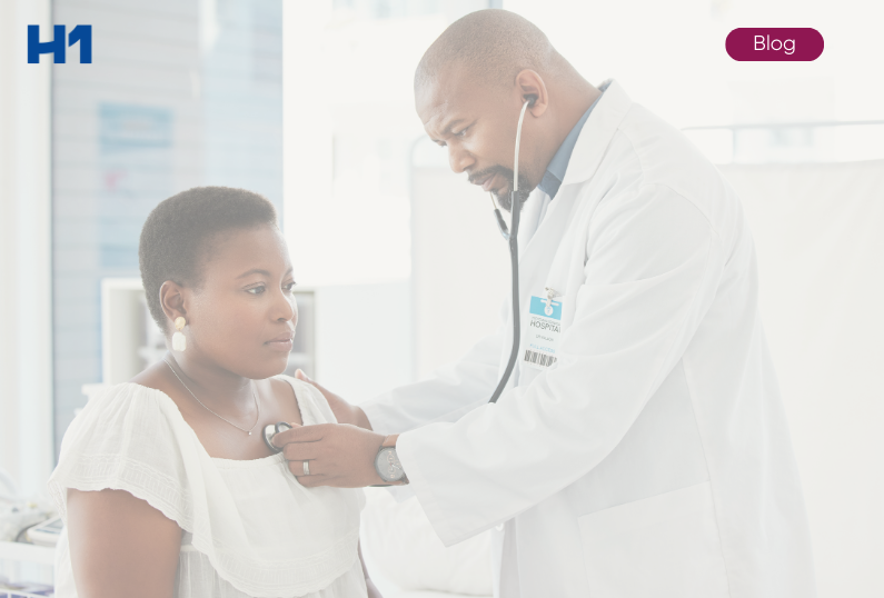 doctor listening to patient's heart
